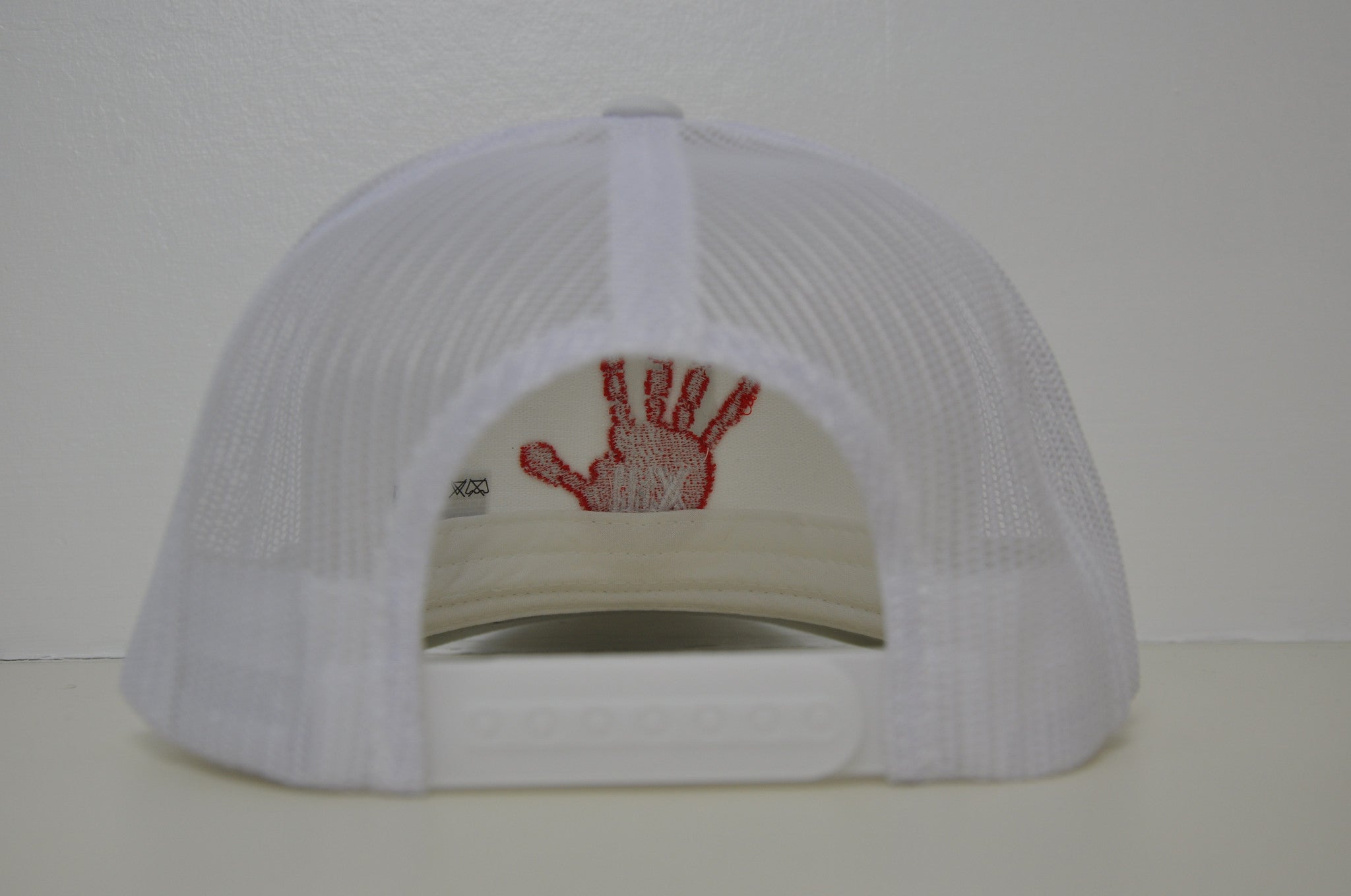 White retro trucker X Red logo