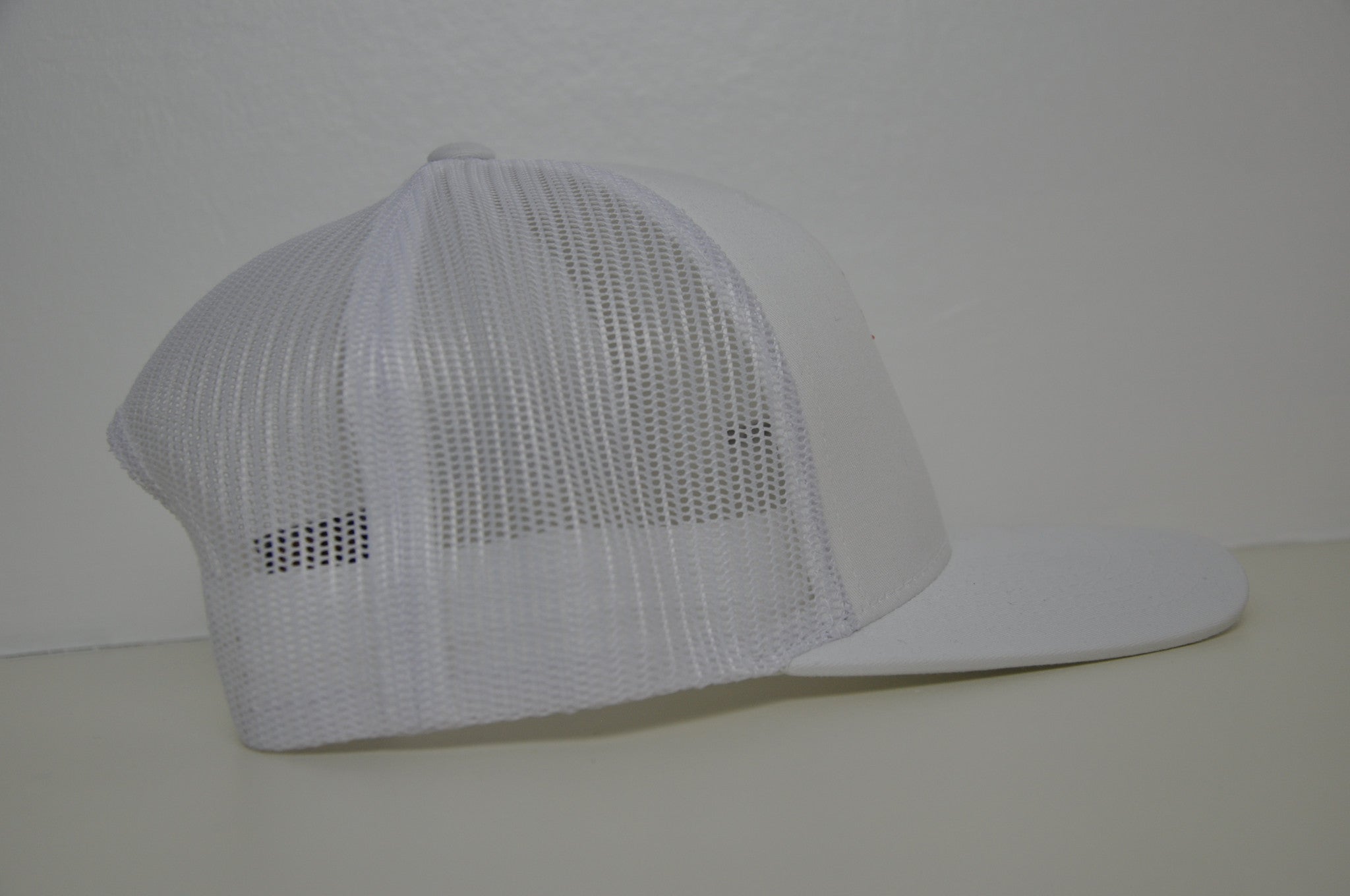 White retro trucker X Red logo